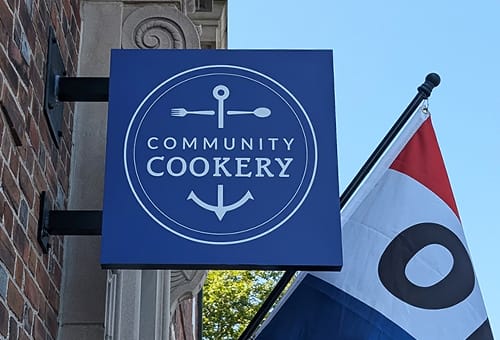 Community Cookery sign with logo